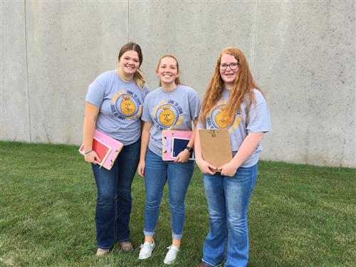  students with clipboards at judging contest
